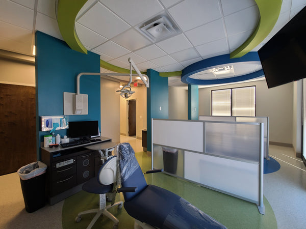 Freestanding room partition to divide medical and office spaces and as a patient privacy screen divider. A modular Medical Partition System for use in Hospitals & Healthcare Facilities, Orthodontics,  Orthodontist, Dental treatment rooms, doctor exam room privacy screen divider and portable room divider partition wall.